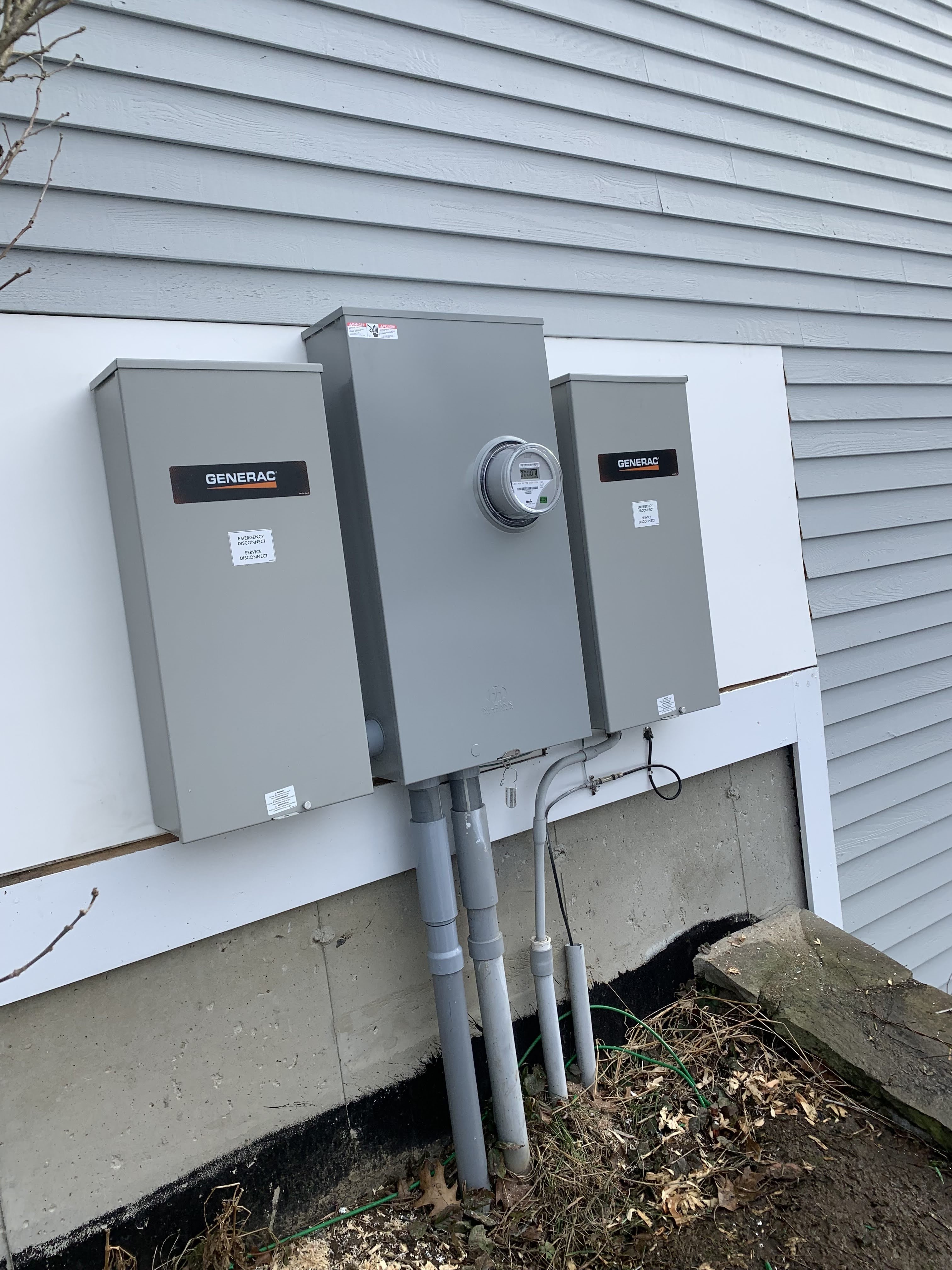 Outdoor panel boxes for a residential property. Meter that measures usage.